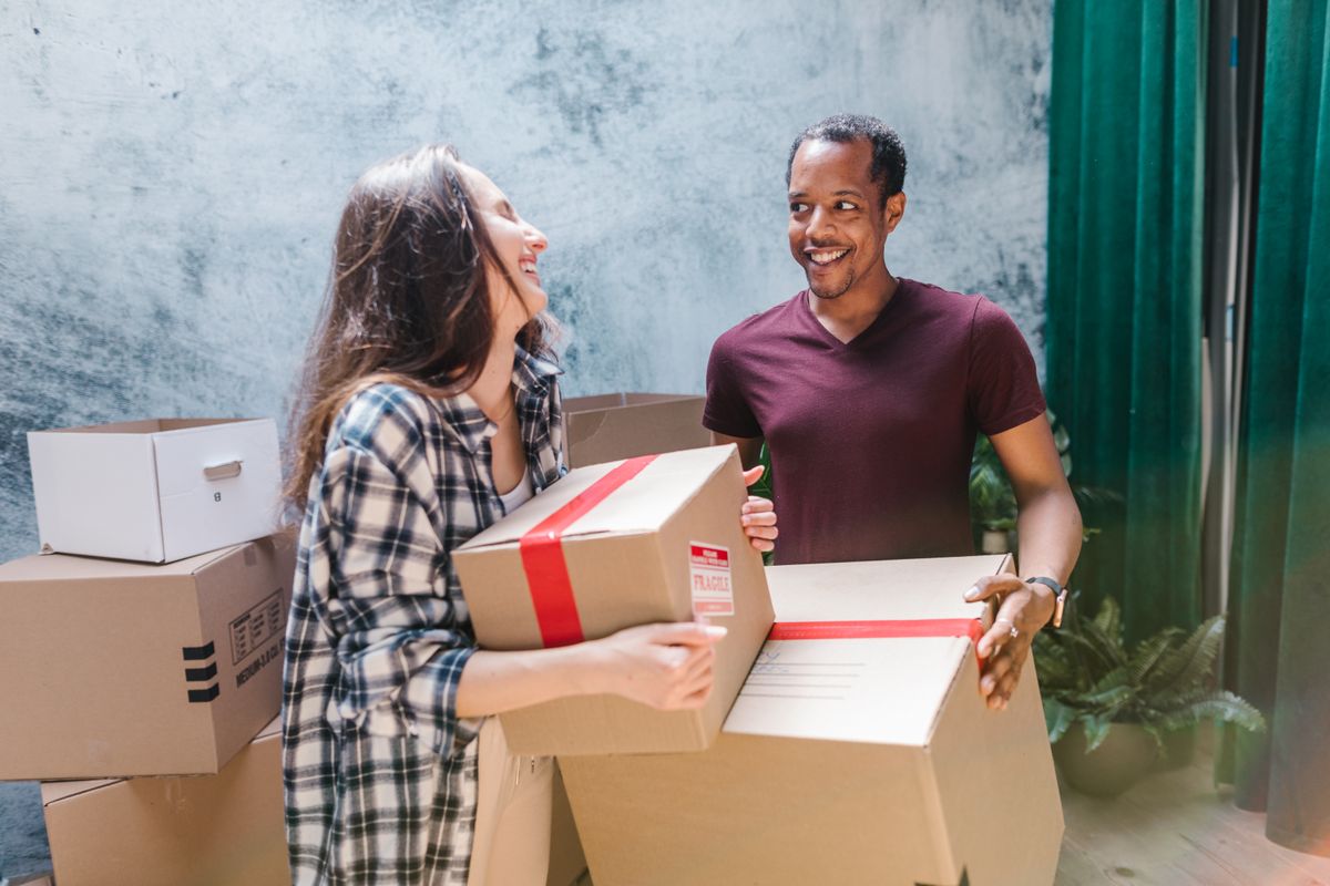 Happy customers with their moving boxes